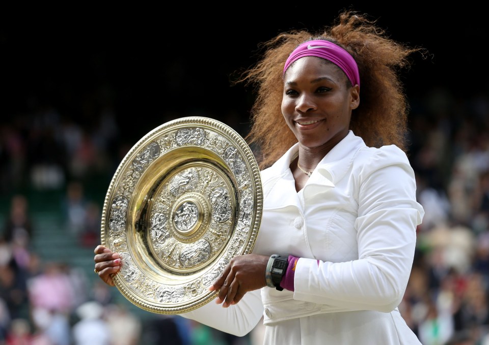 LONDON, ENGLAND - JULY 07:  Serena Williams of the USA lifts the winners trophy and celebrates after her Ladies’ Singles final match against Agnieszka Radwanska of Poland on day twelve of the Wimbledon Lawn Tennis Championships at the All England Lawn Tennis and Croquet Club on July 7, 2012 in London, England.  (Photo by Julian Finney/Getty Images)