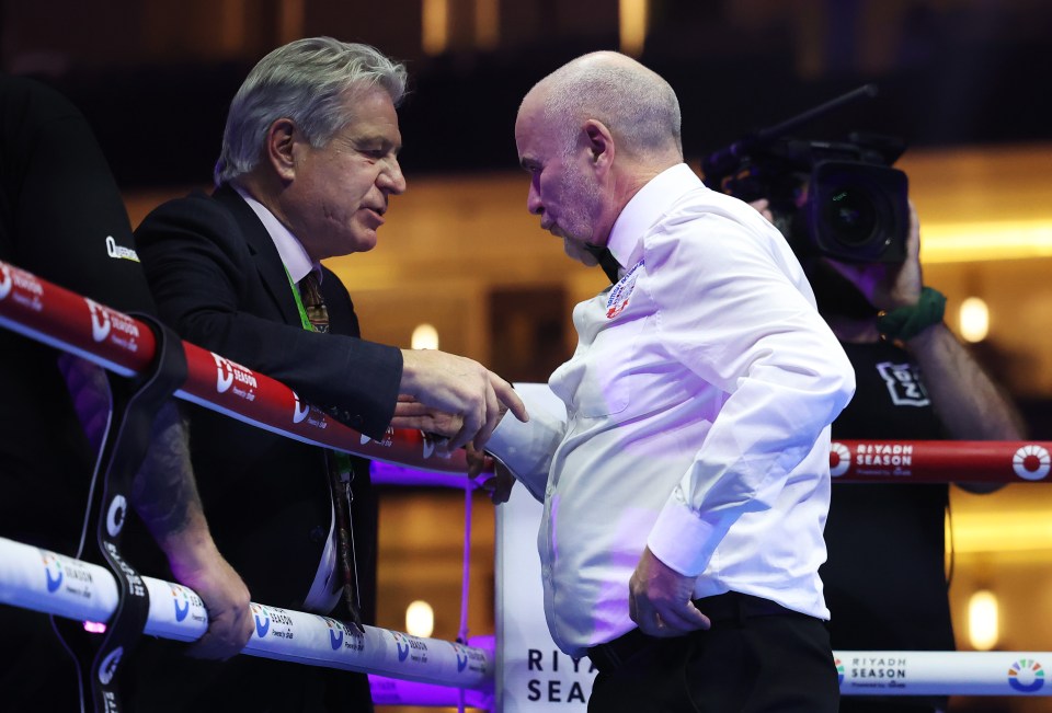 RIYADH, SAUDI ARABIA - OCTOBER 12: Referee Victor Loughlin speaks with Robert Smith, General Secretary of the British Boxing Board of Control, following the Light Heavyweight fight between Ben Whittaker and Liam Cameron as part of the Riyadh Season - IV Crown Showdown card at Kingdom Arena on October 12, 2024 in Riyadh. (Photo by Richard Pelham/Getty Images)