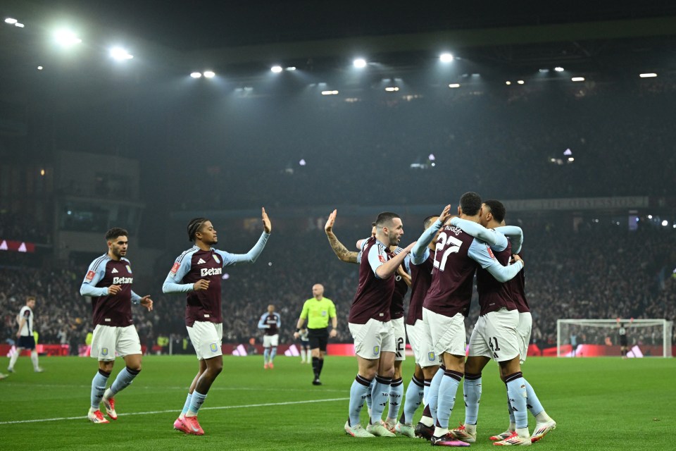 Aston Villa's English midfielder #41 Jacob Ramsey (R) celebrates with teammates after scoring the opening goal of the English FA Cup fourth round football match between Aston Villa and Tottenham Hotspur at Villa Park in Birmingham, central England on February 9, 2025. (Photo by JUSTIN TALLIS / AFP) / RESTRICTED TO EDITORIAL USE. No use with unauthorized audio, video, data, fixture lists, club/league logos or 'live' services. Online in-match use limited to 120 images. An additional 40 images may be used in extra time. No video emulation. Social media in-match use limited to 120 images. An additional 40 images may be used in extra time. No use in betting publications, games or single club/league/player publications. /  (Photo by JUSTIN TALLIS/AFP via Getty Images)