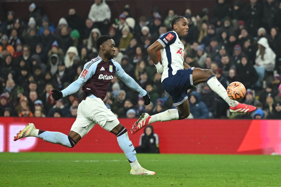 Tottenham Hotspur's French striker #11 Mathys Tel (R) shoots to scote their first goal during the English FA Cup fourth round football match between Aston Villa and Tottenham Hotspur at Villa Park in Birmingham, central England on February 9, 2025. (Photo by JUSTIN TALLIS / AFP) / RESTRICTED TO EDITORIAL USE. No use with unauthorized audio, video, data, fixture lists, club/league logos or 'live' services. Online in-match use limited to 120 images. An additional 40 images may be used in extra time. No video emulation. Social media in-match use limited to 120 images. An additional 40 images may be used in extra time. No use in betting publications, games or single club/league/player publications. /  (Photo by JUSTIN TALLIS/AFP via Getty Images)