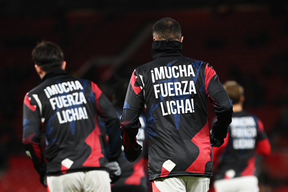 MANCHESTER, ENGLAND - FEBRUARY 07: A detailed view of a Manchester United warm up jacket that displays a message of support for Lisandro Martinez of Manchester United (not pictured) after he was recently injured prior to the Emirates FA Cup Fourth Round match between Manchester United and Leicester City at Old Trafford on February 07, 2025 in Manchester, England. (Photo by Gareth Copley/Getty Images)