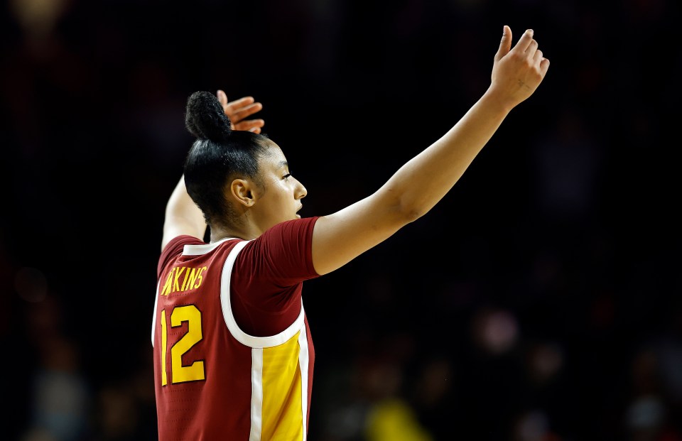 LOS ANGELES, CALIFORNIA - FEBRUARY 13: JuJu Watkins #12 of the USC Trojans celebrates a 71-60 win against the UCLA Bruins in the second half at Galen Center on February 13, 2025 in Los Angeles, California. (Photo by Ronald Martinez/Getty Images)