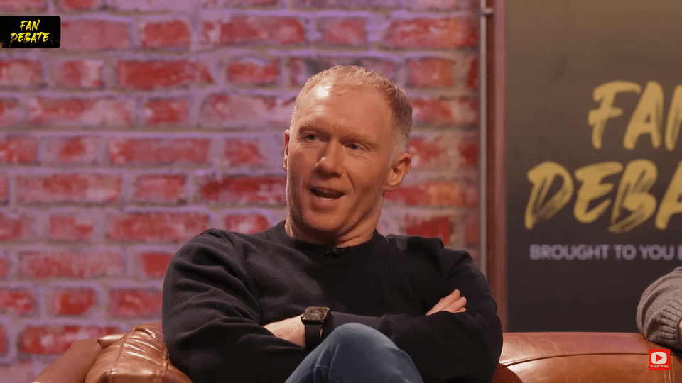 Screenshot of a man on a talk show.