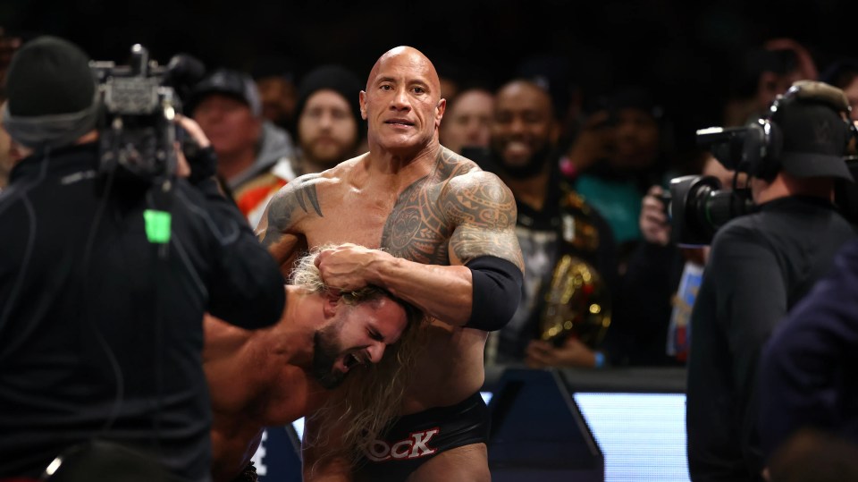 Dwayne "The Rock" Johnson in a wrestling match.