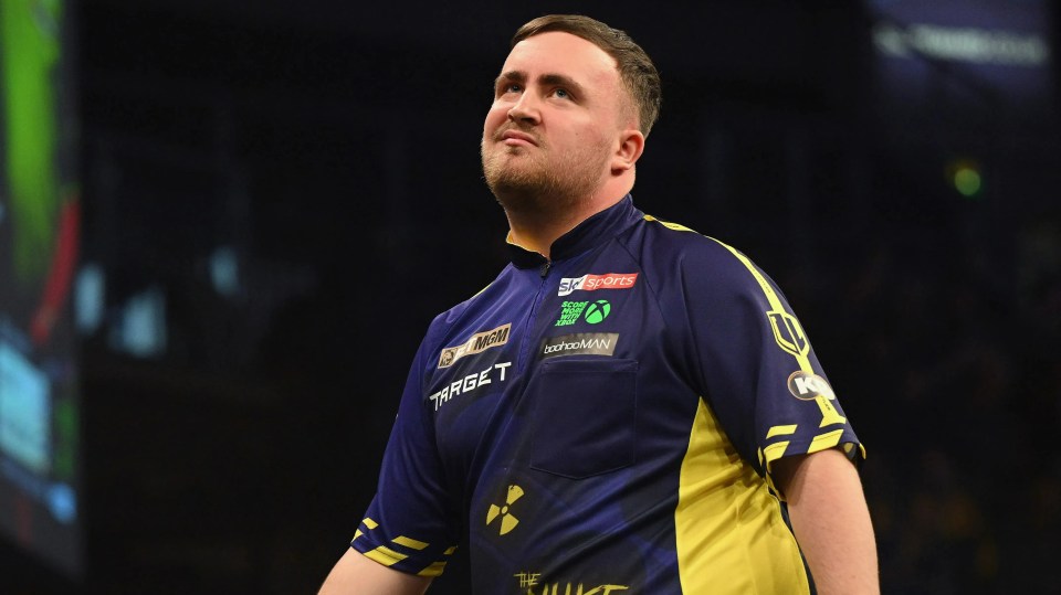 Luke Littler competing in darts.