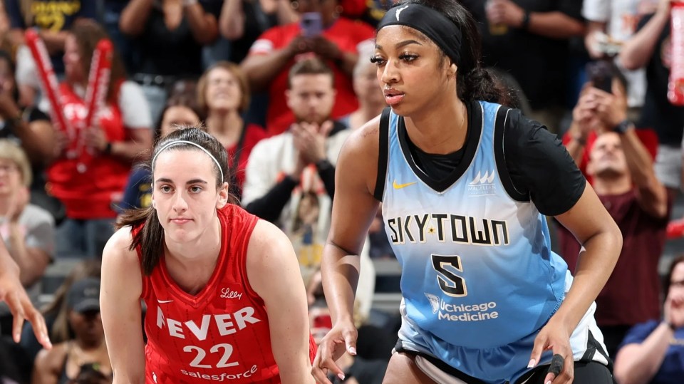 Caitlin Clark and Angel Reese at a WNBA game.