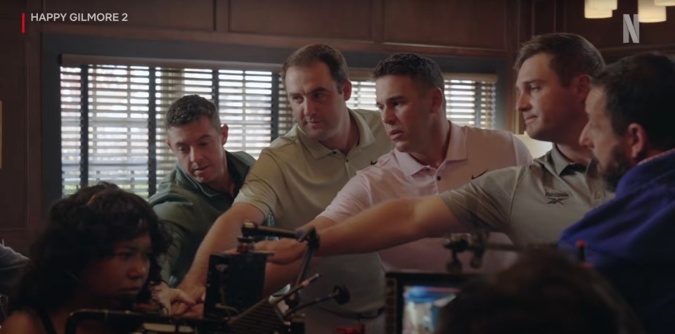 Footage shows the golfers huddling together as a team during filming