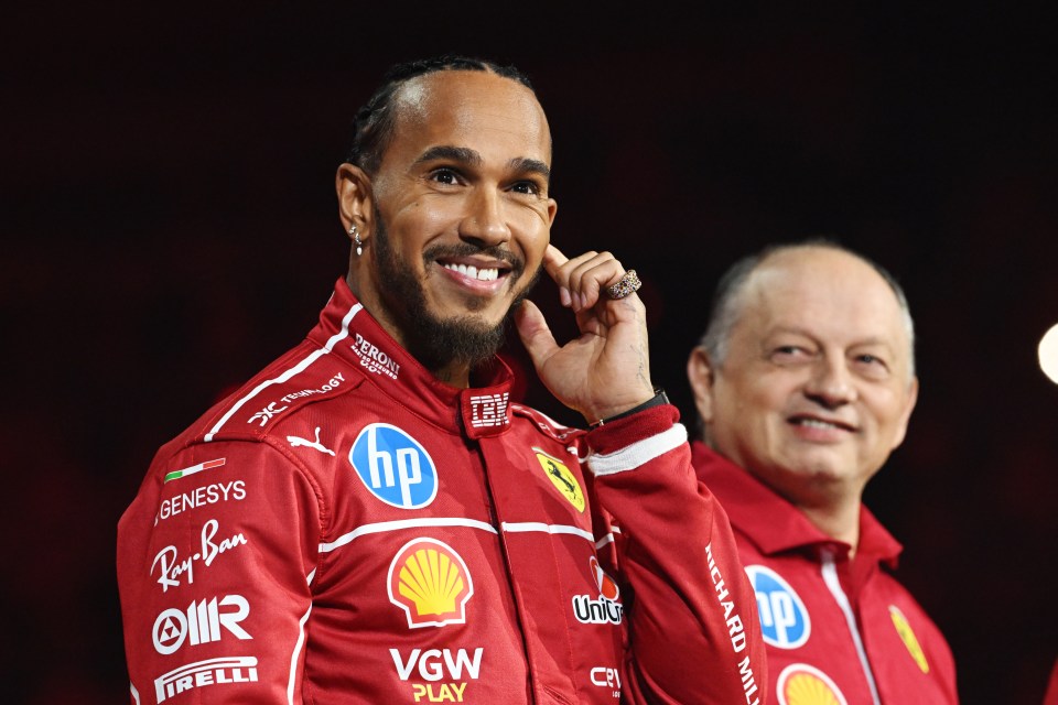 Lewis Hamilton in a Ferrari racing jacket.