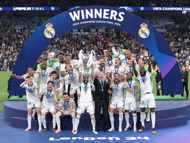 Real Madrid lift the Champions League trophy
