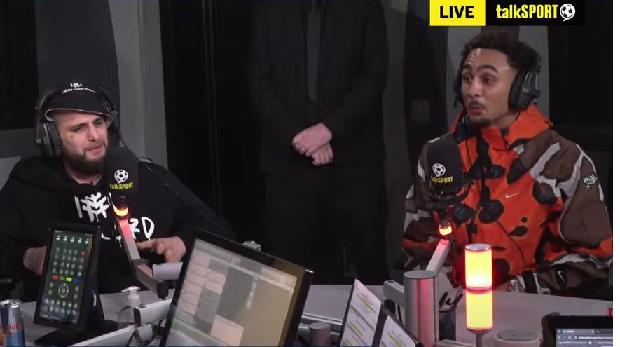 Whittaker and Cameron were watched over by security in the talkSPORT studio in February