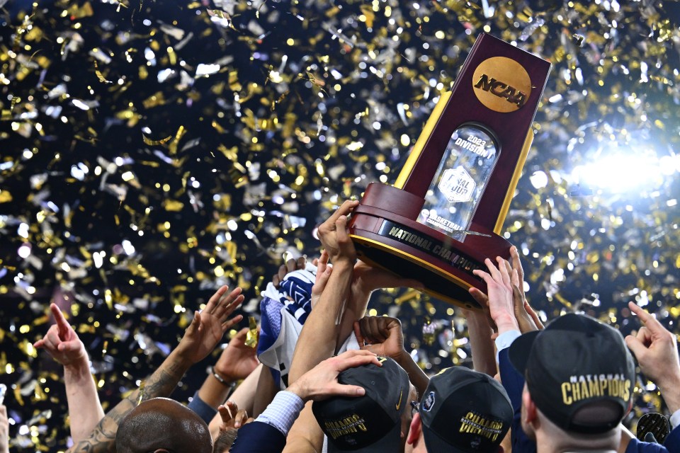 HOUSTON, TEXAS - APRIL 03: The Connecticut Huskies celebrate with the trophy after defeating the San Diego State Aztecs to win the NCAA Men's Basketball Tournament National Championship at NRG Stadium on April 03, 2023 in Houston, Texas. (Photo by Brett Wilhelm/NCAA Photos via Getty Images)