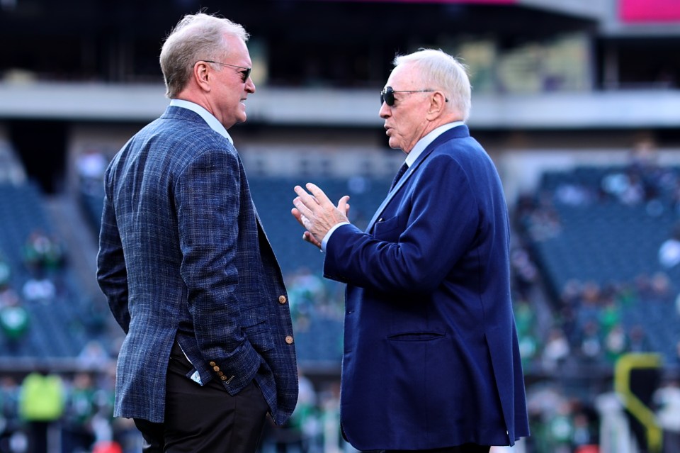 PHILADELPHIA, PENNSYLVANIA - NOVEMBER 05: Steven Jones speaks with owner Jerry Jones of the Dallas Cowboys prior to the game against the Philadelphia Eagles at Lincoln Financial Field on November 05, 2023 in Philadelphia, Pennsylvania. (Photo by Tim Nwachukwu/Getty Images)