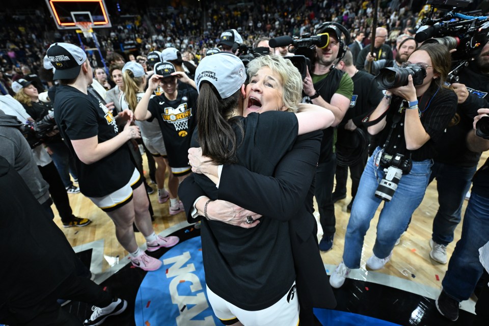 ALBANY, NEW YORK - APRIL 01: Caitlin Clark #22 of the Iowa Hawkeyes celebrates with head coach Lisa Bluder of the Iowa Hawkeyes after defeating the LSU Tigers during the Elite Eight round of the 2024 NCAA Women's Basketball Tournament held at MVP Arena on April 1, 2024 in Albany, New York. (Photo by Greg Fiume/NCAA Photos via Getty Images)