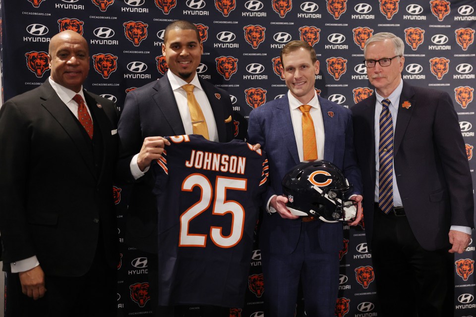 LAKE FOREST, ILLINOIS - JANUARY 22: President Kevin Warren, general manager Ryan Poles, newly named head coach Ben Johnson and chairman George McCaskey of the Chicago Bears pose for a photo during a introductory press conference at PNC Center at Halas Hall on January 22, 2025 in Lake Forest, Illinois. (Photo by Michael Reaves/Getty Images)
