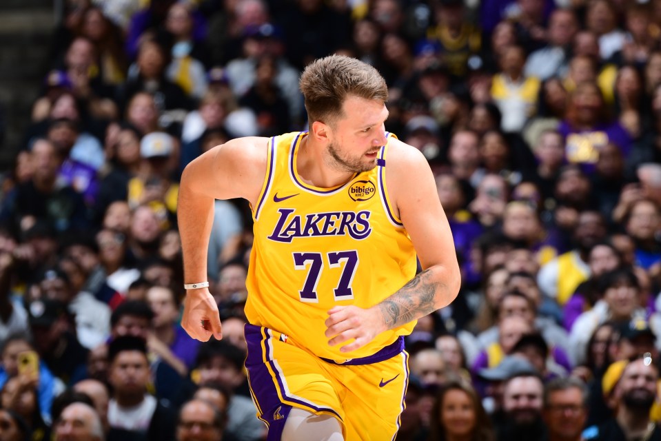 LOS ANGELES, CA - MARCH 4: Luka Doncic #77 of the Los Angeles Lakers looks on during the game against the New Orleans Pelicans on March 4, 2025 at Crypto.Com Arena in Los Angeles, California. NOTE TO USER: User expressly acknowledges and agrees that, by downloading and/or using this Photograph, user is consenting to the terms and conditions of the Getty Images License Agreement. Mandatory Copyright Notice: Copyright 2025 NBAE (Photo by Adam Pantozzi/NBAE via Getty Images)