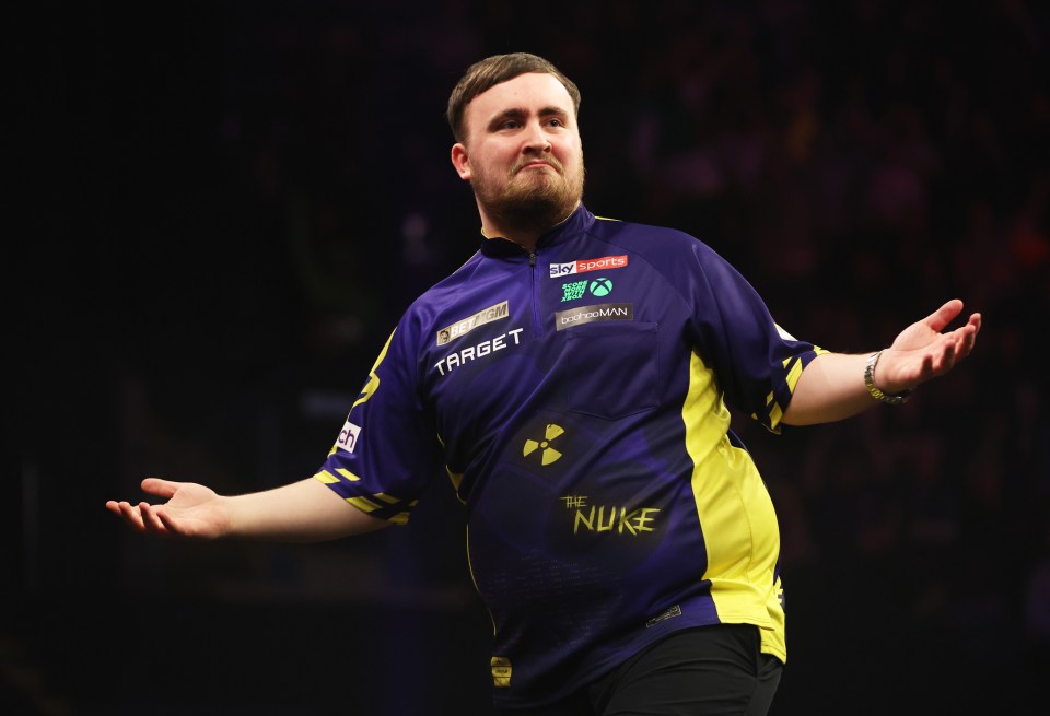 NOTTINGHAM, ENGLAND - MARCH 13: Luke Littler of England celebrates against Rob Cross of England during the Semi Final match on Night Six of the 2025 BetMGM Premier League Darts at Motorpoint Arena Nottingham on March 13, 2025 in Nottingham, England. (Photo by Cameron Smith/Getty Images)