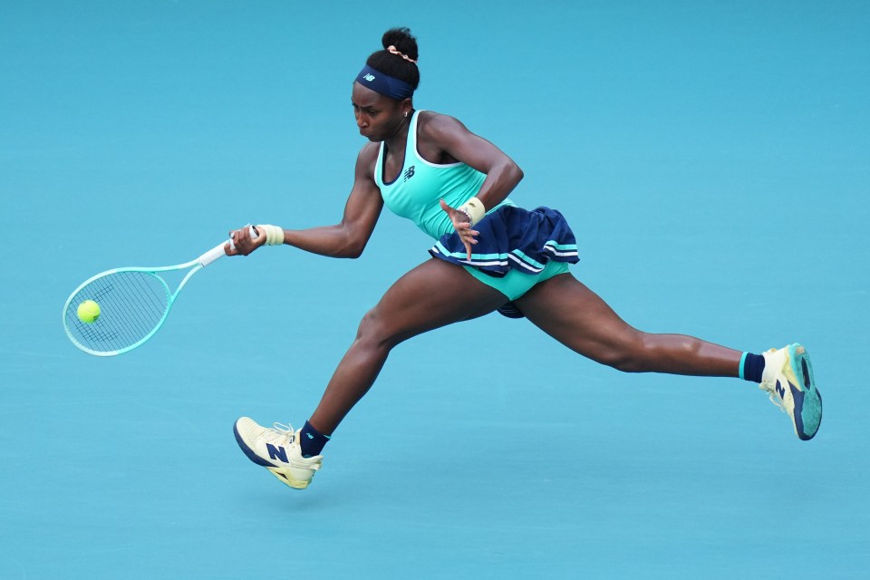 MIAMI GARDENS, FLORIDA - MARCH 24: Coco Gauff of the United States returns a shot against Magda Linette of Poland during their match on day 7 of the Miami Open at Hard Rock Stadium on March 24, 2025 in Miami Gardens, Florida. (Photo by Rich Storry/Getty Images)