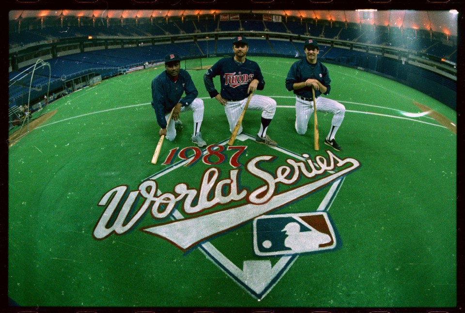 (Original Caption) Minnesota Twins' starting rotation for the World Series, Frank Viola (right), Bert Blyleven (center) and Les Straker (left), who will pitch games 1, 2, and 3 respectively, give a mean look with their bats during a workout at the Metrodome. The Twins pitchers, who never use bats during the regular season, will get their turn at the plate when the games are played in the National League city of St. Louis. Game #1 of the World Series opens in The Minneapolis Metrodome on October 17.