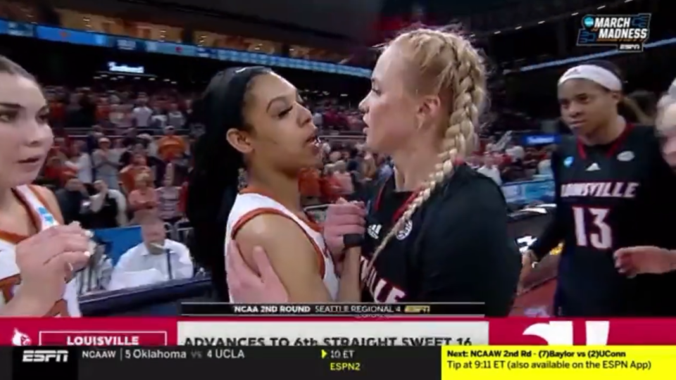 The former Louisville star shared a heated handshake with Longhorns guard Morris