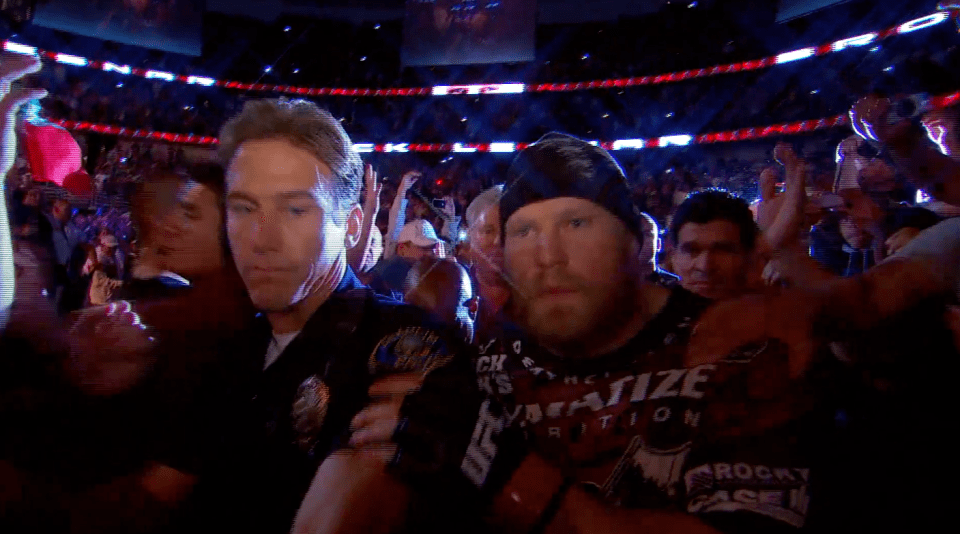 Lesnar brushed the cop aside