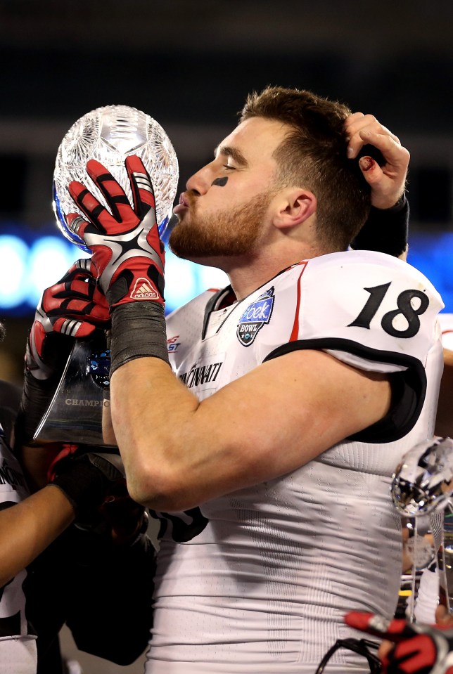 Kelce celebrated in 2012 with Cincinnati after scoring a game-winning touchdown