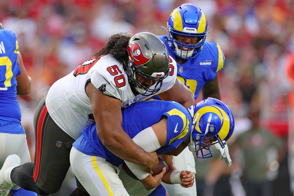 TAMPA, FLORIDA - NOVEMBER 06: Vita Vea #50 of the Tampa Bay Buccaneers sacks Matthew Stafford #9 of the Los Angeles Rams during the first quarter at Raymond James Stadium on November 06, 2022 in Tampa, Florida. (Photo by Mike Ehrmann/Getty Images)