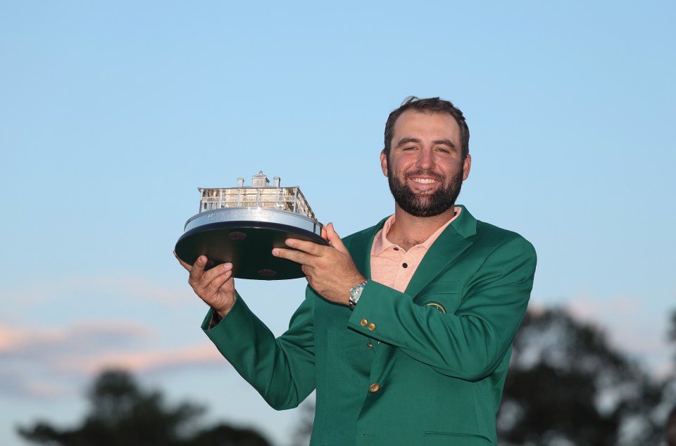 AUGUSTA, GEORGIA - APRIL 14: Scottie Scheffler of the United States poses with the Masters trophy after winning the 2024 Masters Tournament at Augusta National Golf Club on April 14, 2024 in Augusta, Georgia. (Photo by Warren Little/Getty Images)