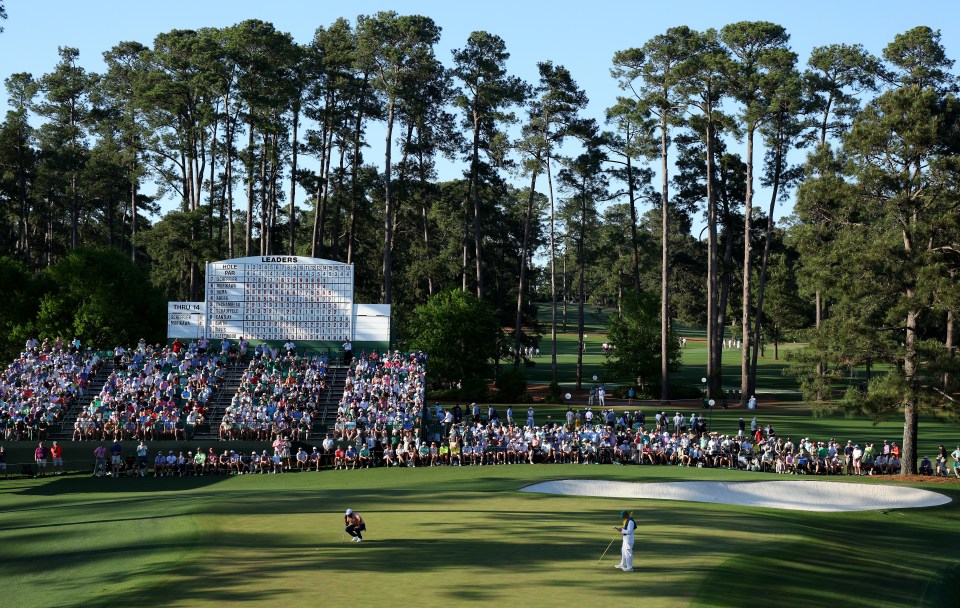 AUGUSTA, GEORGIA - APRIL 14: Scottie Scheffler of the United States putts out on the 15th green during the final round of the 2024 Masters Tournament at Augusta National Golf Club on April 14, 2024 in Augusta, Georgia. (Photo by Andrew Redington/Getty Images)