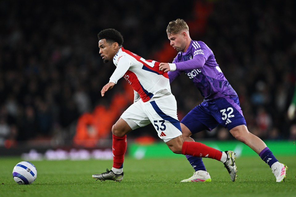 LONDON, ENGLAND - APRIL 01: Ethan Nwaneri of Arsenal is challenged by Emile Smith Rowe of Fulham during the Premier League match between Arsenal FC and Fulham FC at Emirates Stadium on April 01, 2025 in London, England. (Photo by Shaun Botterill/Getty Images)