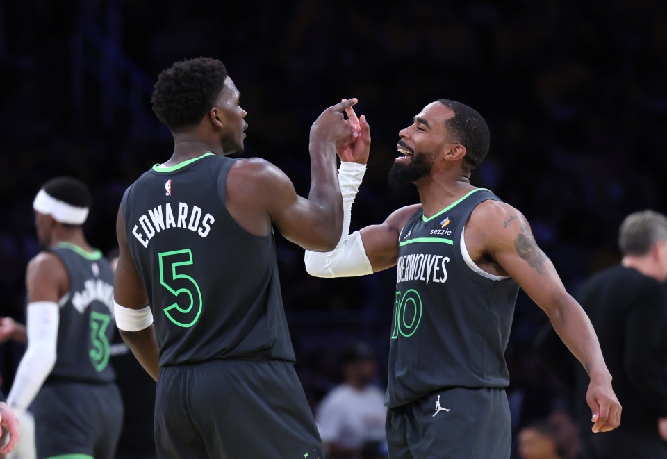 Los Angeles, CA - April 19: Minnesota Timberwolves guard Anthony Edwards (5) and Minnesota Timberwolves guard Mike Conley (10) celebrate during playoff gamer vs. The Lakers at Crypto.com Arena in Los Angeles Saturday, April 19, 2025. (Allen J. Schaben / Los Angeles Times via Getty Images)