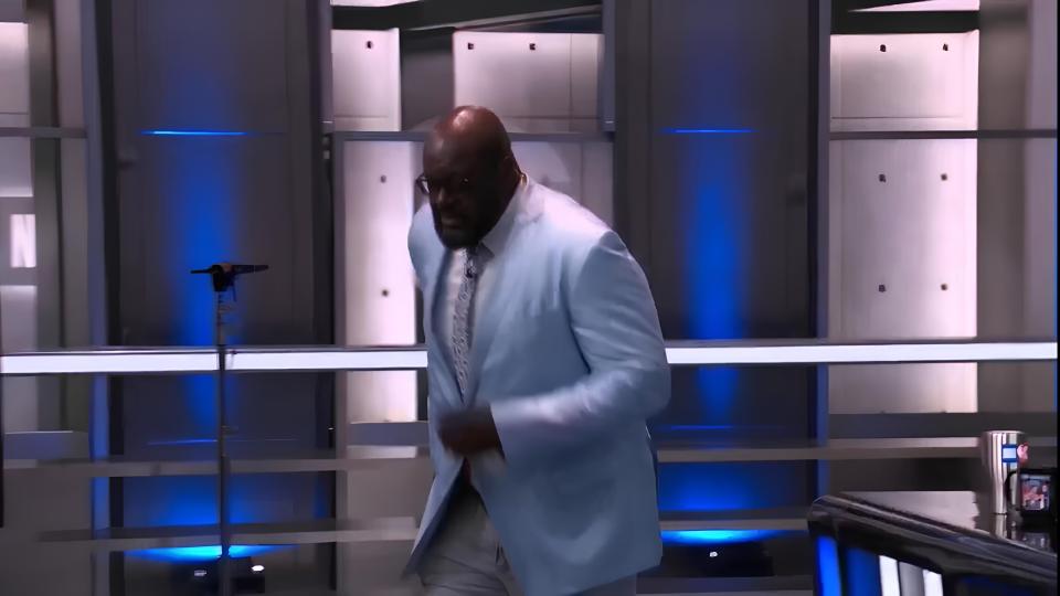 The camera followed O'Neal as he walked off the set