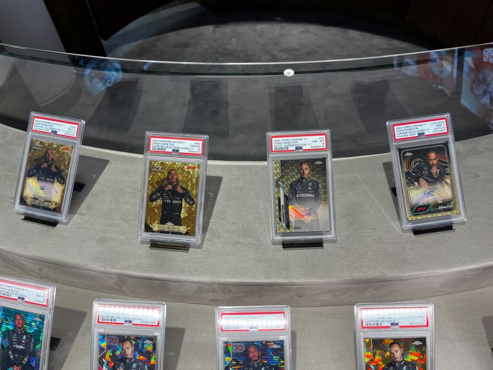 The iconic driver's 1/1 superfractor (middle right) sold for a stunning $900k