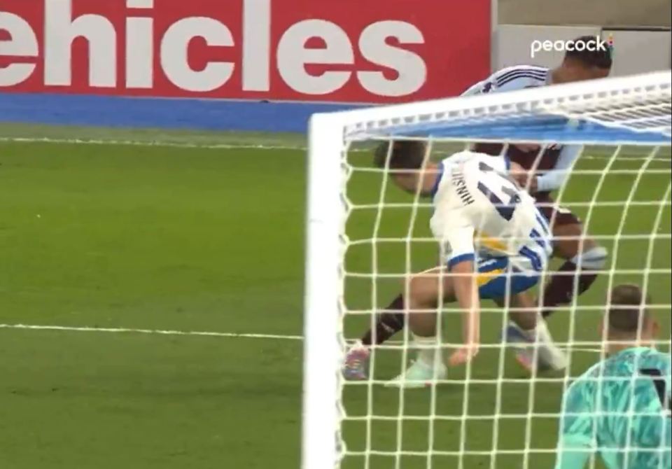 Brighton's Hinshelwood was a lucky man not to have given a penalty away