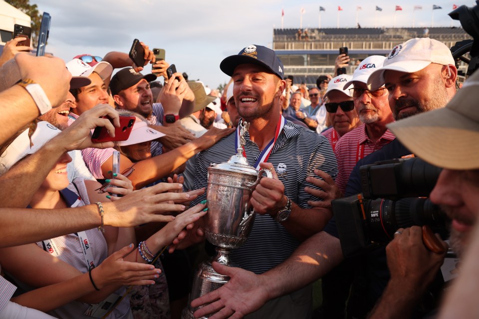 DeChambeau allowed fans to feel the power of a major trophy