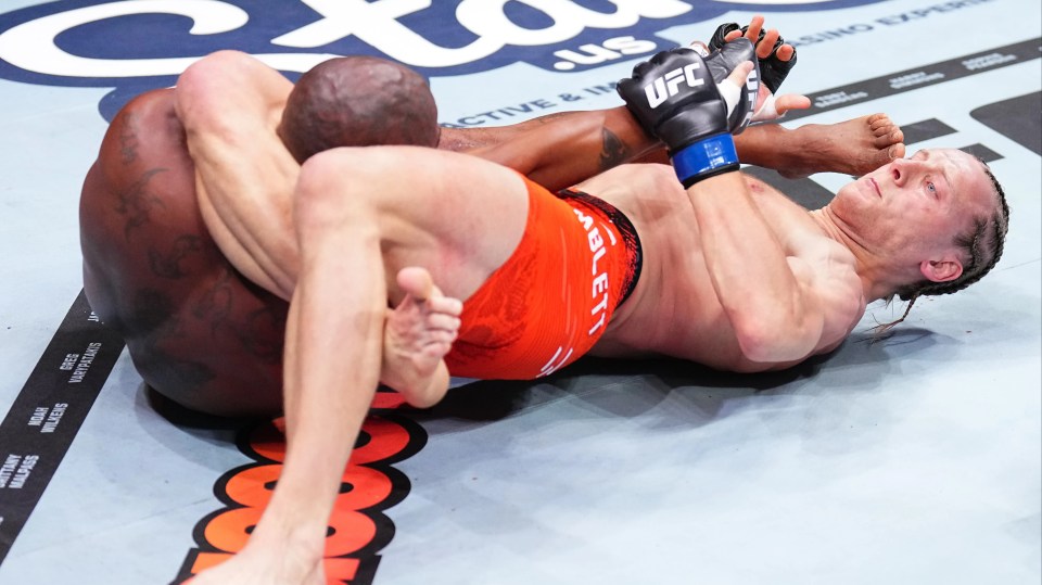 Paddy Pimblett securing a submission in a UFC match.