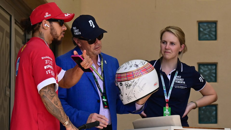 All 20 living F1 champions, including Hamilton and Schumacher, signed the helmet