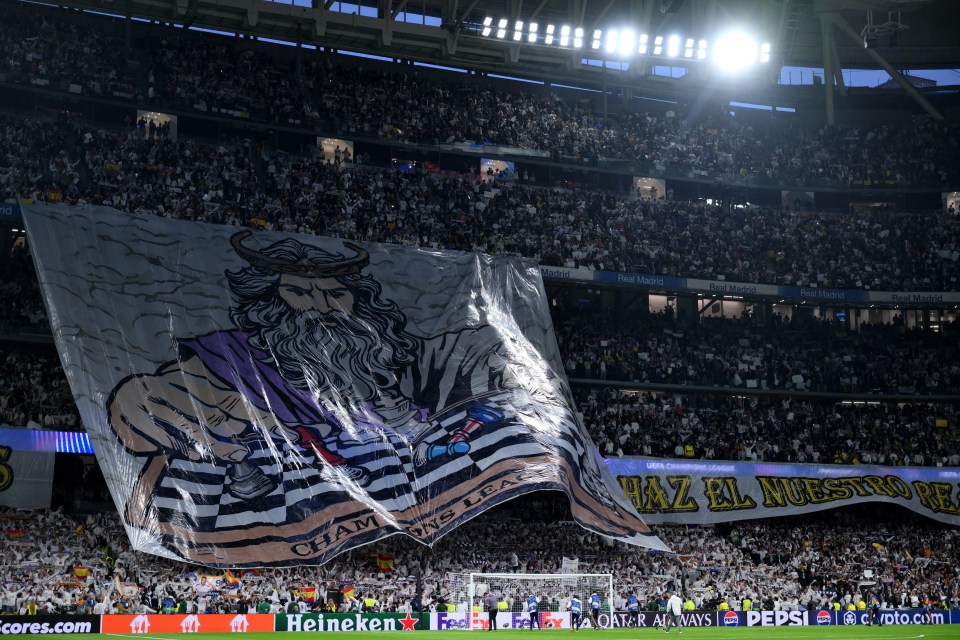 The chessboard design appears to be a reference to the tifo Mads fans unveiled against Arsenal