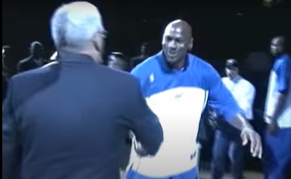 MJ shook hands with Clay and the pair hugged it out