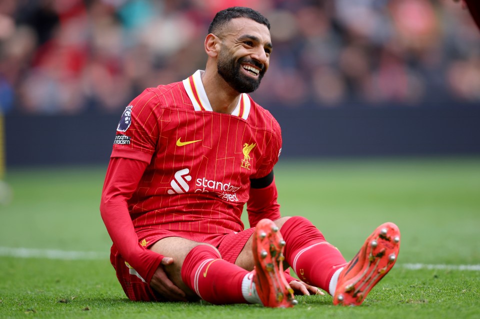 Salah appeared delighted to have extended his deal
