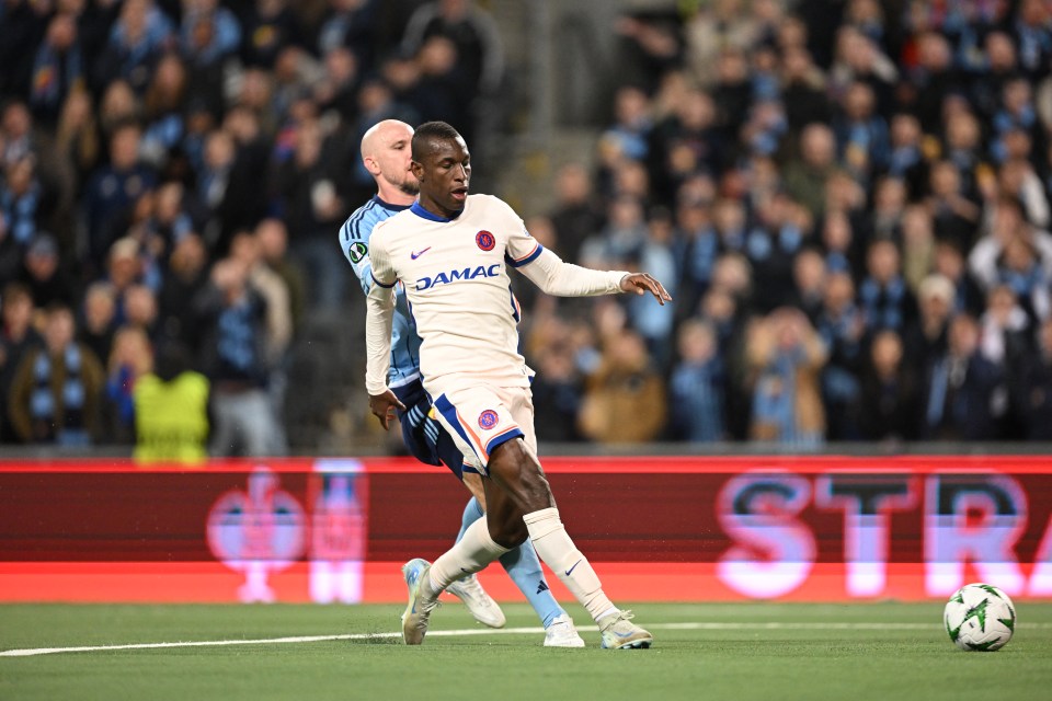 Chelsea's Senegalese striker #15 Nicolas Jackson (R) scores the 0-3 goal passed Djurgardens' Swedish defender #03 Marcus Danielson during the UEFA Conference League semi-final football match Djurgardens IF vs Chelsea FC at the 3Arena in Stockholm, Sweden, on May 1, 2025, (Photo by Jonathan NACKSTRAND / AFP) (Photo by JONATHAN NACKSTRAND/AFP via Getty Images)