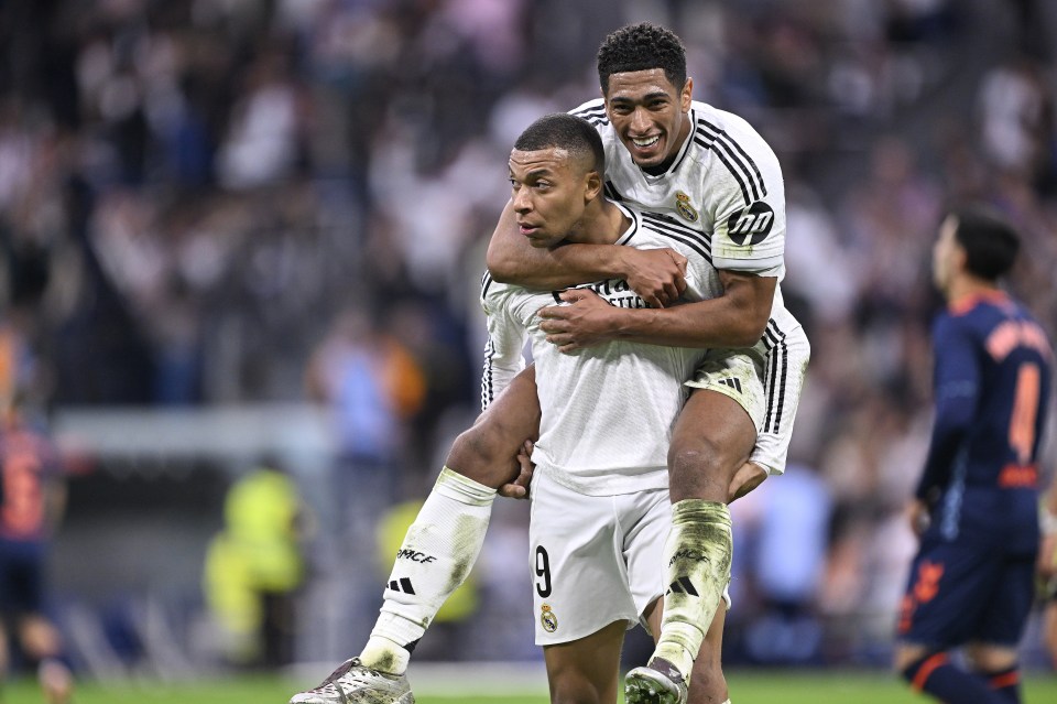 MADRID, SPAIN - MAY 04: Kylian Mbappe (front) of Real Madrid celebrates after scoring a goal with his teammate Jude Bellingham (rear) during La Liga match between Real Madrid and Celta Vigo at Santiago Bernabeu in Madrid, Spain on May 04, 2025. (Photo by Burak Akbulut/Anadolu via Getty Images)