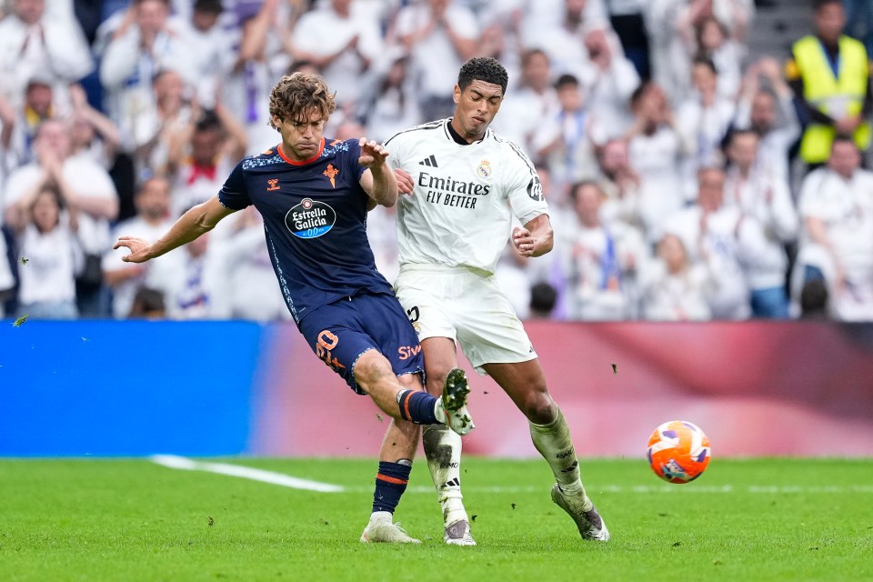MADRID, SPAIN - MAY 04: Marcos Alonso of Celta de Vigo and Jude Bellingham of Real Madrid in action during the Spanish League, LaLiga EA Sports, football match played between Real Madrid and RC Celta de Vigo at Santiago Bernabeu stadium on May 04, 2025 in Madrid, Spain. (Photo By Oscar J. Barroso/Europa Press via Getty Images)